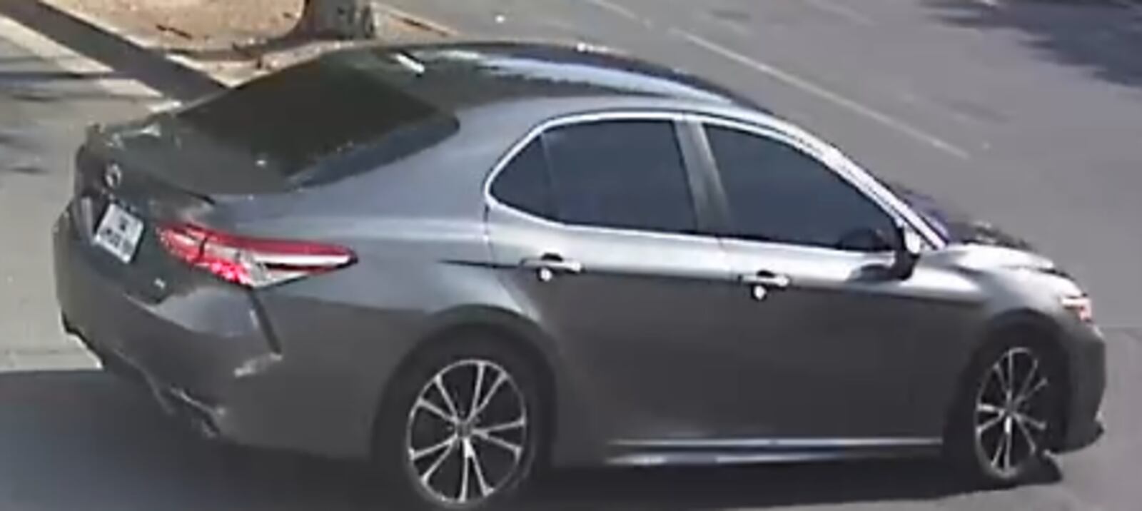 The man fled the scene in a dark gray Toyota Camry with a “tag applied for” license plate.