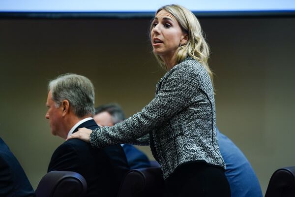 October 3, 2019 -- Defense attorney Amanda Clark Palmer holds the shoulders of Robert "Chip" Olsen while giving her closing argument during day five of Olsen's murder trial at the DeKalb County Courthouse on October 3, 2019 in Decatur. Olsen is charged with murdering war veteran Anthony Hill. (Elijah Nouvelage for The Atlanta Journal-Constitution)