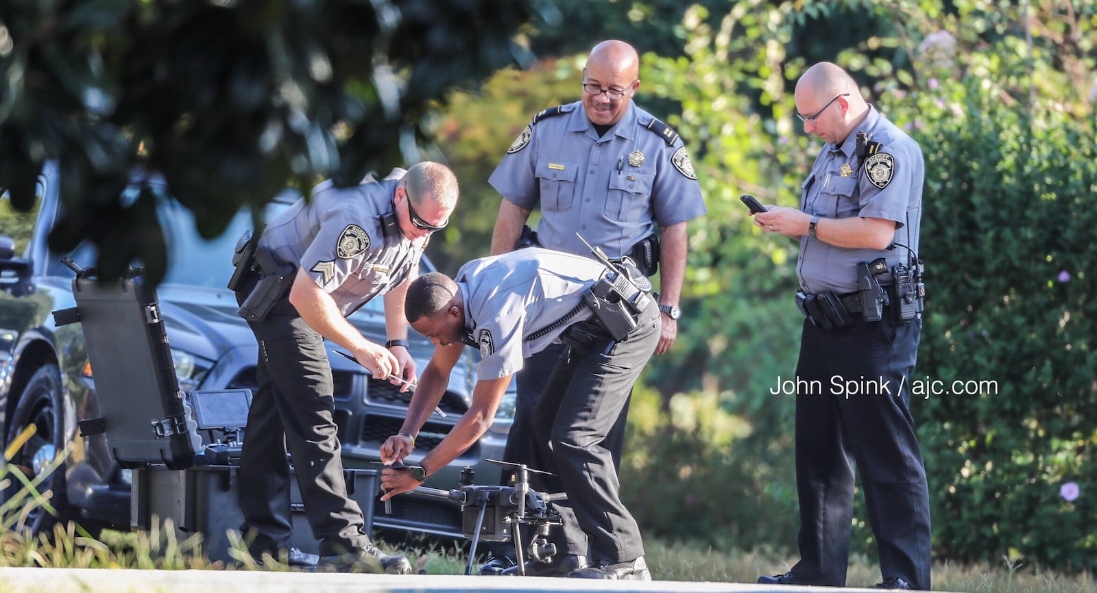 Rockdale County deputies prepare a drone to photograph the scene.