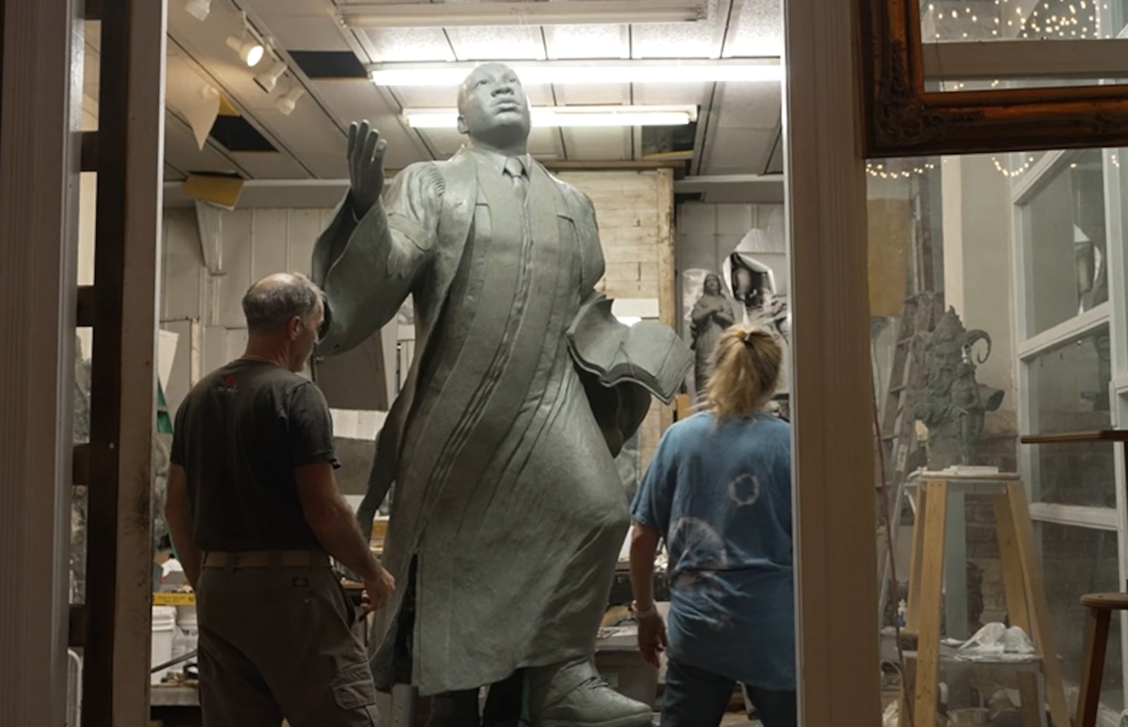 Sculptors Stan Mullins of Athens and Kathy Fincher of Duluth give a preview of the King statue that will be installed at Rodney Cook Sr. Peace Park in Atlanta. (World Peace Revival)