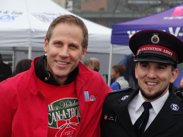 Vinnie Politan with one of the Salvation Army staff. CREDIT: Rodney Ho/rho@ajc.com