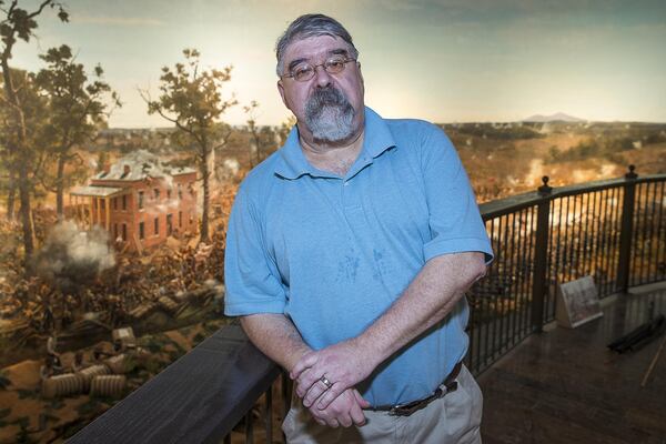 Gordon Jones, senior military historian and curator at the Atlanta History Center, said the roof on the temporary building on Edgewood Avenue that housed “The Battle of Atlanta” collapsed twice, in 1893 and 1898. Then the painting was delivered to Grant Park and sat out in the weather for about four weeks. The restored painting will open to the public Feb. 22. ALYSSA POINTER / ALYSSA.POINTER@AJC.COM