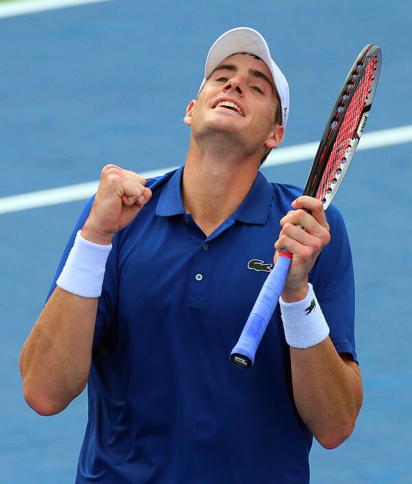 John Isner reacts to defeating Lleyton Hewitt 6-4, 4-6, 7-6 (5) to win their semifinals match and advance to the final at the BB&T Atlanta Open in 2013. CURTIS COMPTON / CCOMPTON@AJC.COM