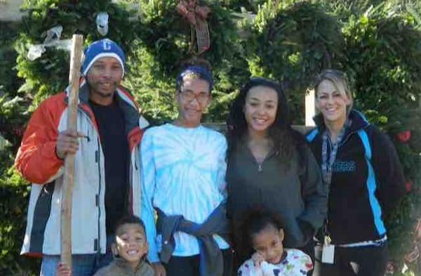 Lee Broadway, on the far right, is pictured here with her family, including her husband, Eric Broadway, far left, and her four children.