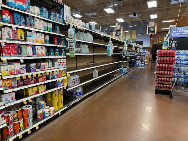 Shoppers have cleaned out the bottled water shelves at the Kroger on Glenwood Avenue on Thursday morning.