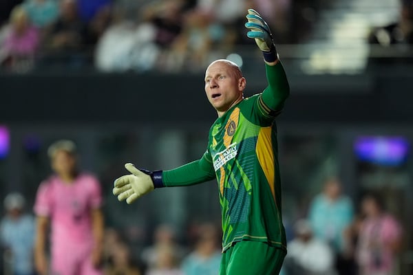 Atlanta United goalkeeper Brad Guzan (1) reacts during the second half of their MLS playoff opening round soccer match against Inter Miami, Friday, Oct. 25, 2024, in Fort Lauderdale, Fla. (AP Photo/Rebecca Blackwell)