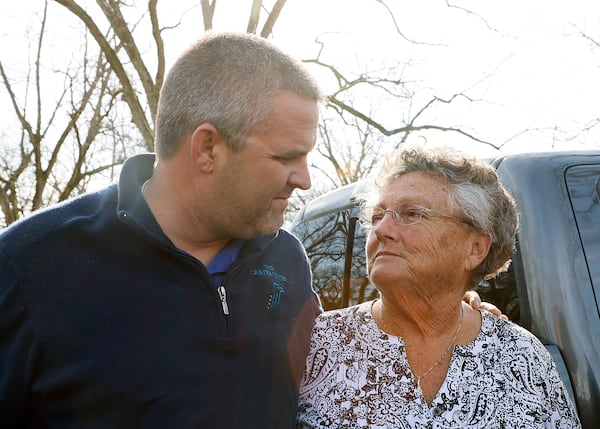 Zac Steele (left) and Jan Williams (right) share a moment as they talked to media before Sunday service at Maranatha Baptist Church. Neighbors, friends and church members of former President Jimmy Carter gathered at the church in Plains, Sunday, February 19, where Carter long taught Sunday school lessons until his health declined. The former U.S. president and Georgia governor, 98 years old, is in hospice at home in Plains, Georgia. (Ryon Horne / Ryon.Horne@ajc.com)