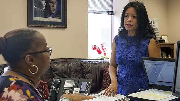 Georgia Rep. Brenda Lopez Romero, D-Norcross (right) speaks with administrative assistant JC Bryant in her office at the Coverdell Legislative Office Building in Atlanta on Thursday, July 18, 2019. ALYSSA POINTER/ALYSSA.POINTER@AJC.COM