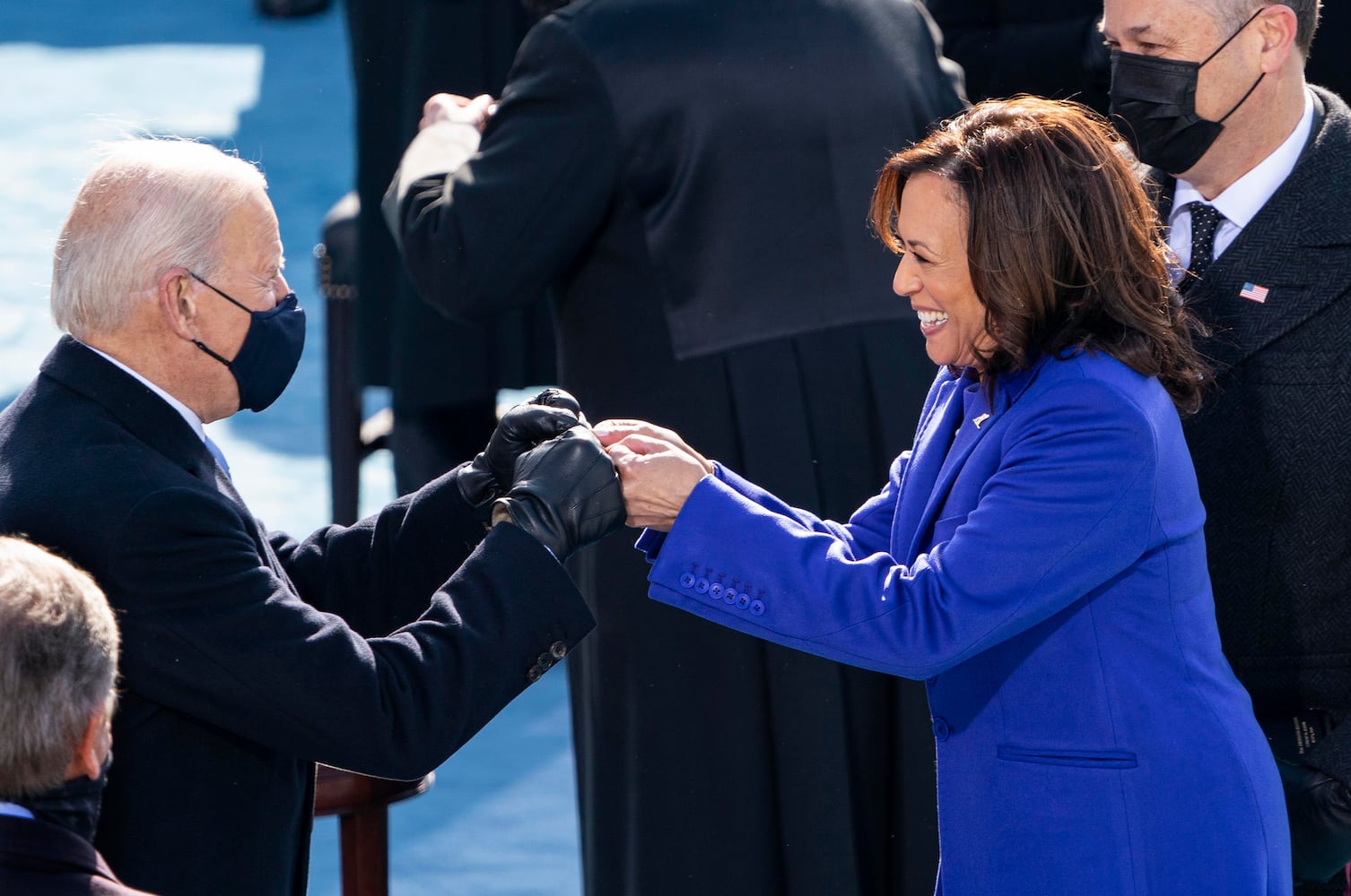 After being sworn in Vice President Kamala Harris gives Joe Biden a fist bump at the Capitol in Washington in Washington on Wednesday, Jan. 20, 2021. (Ruth Fremson/The New York)