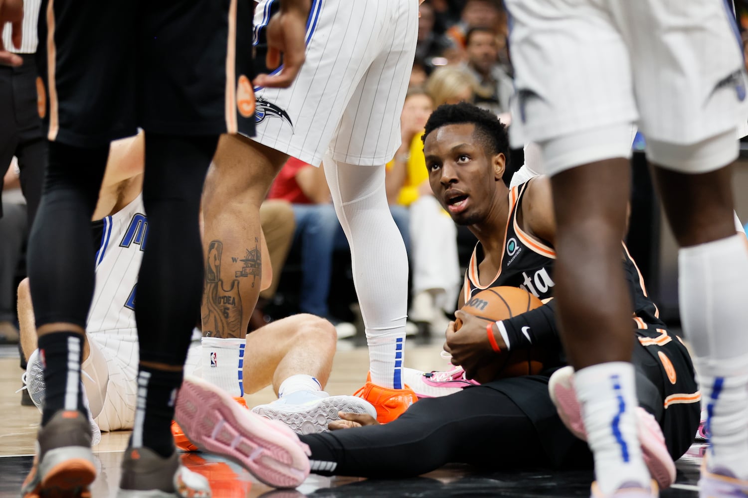 Hawks forward Onyeka Okongwu recovers a rebound during the second half against the Magic on Monday night in Atlanta. (Miguel Martinez / miguel.martinezjimenez@ajc.com)