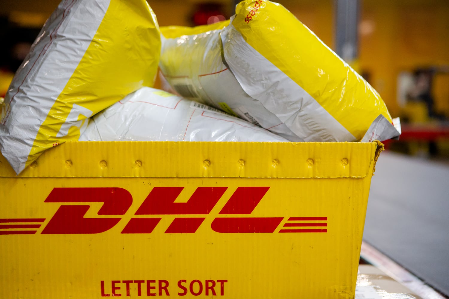 A box of DHL packages is prepared to be shipped on Wednesday, December 16, 2020, at DHL Express in Atlanta. Workers at the shipping center worked to fulfill orders during the holiday rush. CHRISTINA MATACOTTA FOR THE ATLANTA JOURNAL-CONSTITUTION.