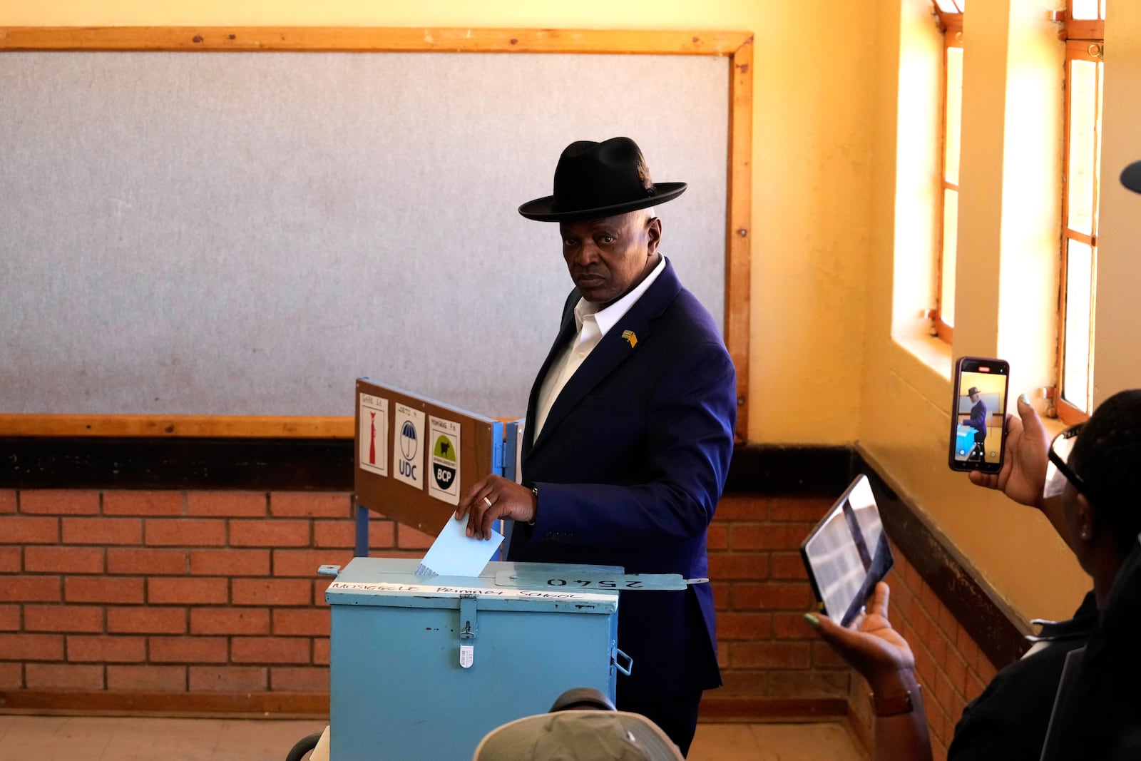 Botswana Democratic Party President Mokgweetsi Masisi casts his vote during an election to decide if it keeps faith with one of the Africa's longest-ruling parties, at a Mosielele primary school in Moshupa village, southern District of Botswana, Wednesday, Oct. 30, 2024. (AP Photo/Themba Hadebe)