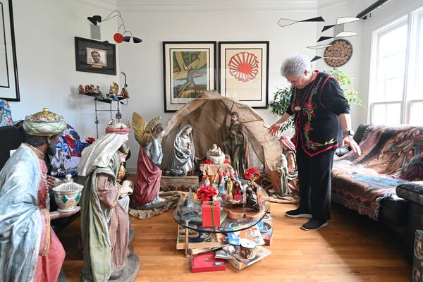 Marielos Bond has more than 1,000 scenes decorating every corner of her house in Alpharetta on Saturday, December 17, 2022. (Hyosub Shin / Hyosub.Shin@ajc.com)