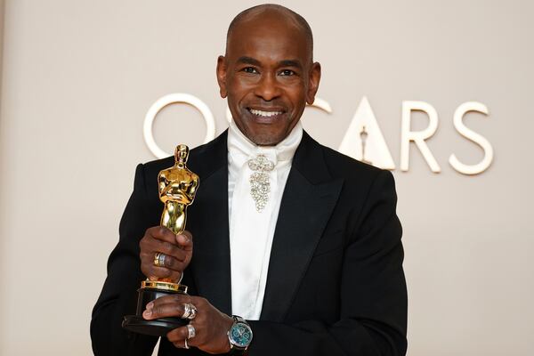 Paul Tazewell, winner of the award for best costume design for "Wicked," poses in the press room at the Oscars on Sunday, March 2, 2025, at the Dolby Theatre in Los Angeles. (Photo by Jordan Strauss/Invision/AP)