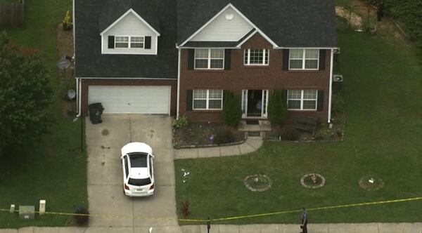 Vera Tulbure was stabbed Monday in this house on Crescent Walk Lane in Suwanee, police said. (Credit: Channel 2 Action News)