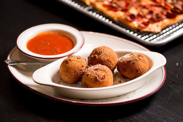 Rice Balls starter with risotto, pecorino, and mozzarella. Photo credit- Mia Yakel.