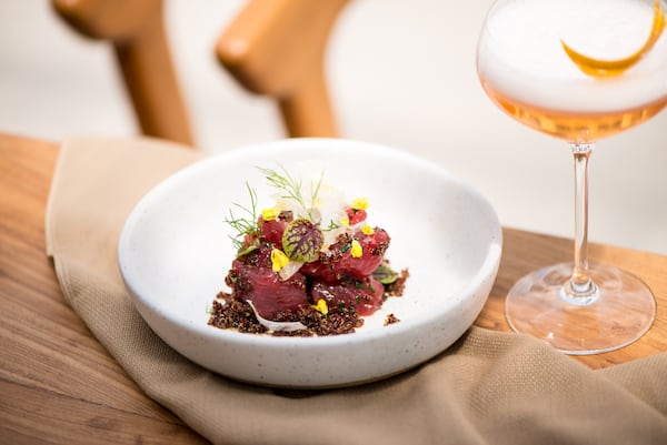 Lapeer Seafood Market Tuna Cubes wiht fennel, chili oil, puffed quinoa, and peruvian pink salt.