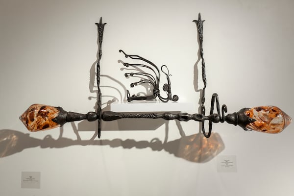 1995's “Crown & Scepter,” crafted from glass and steel, is on view in Corrina Sephora's "Across the Waters of Time: 30 Years of Creativity" at Emma Darnell Aviation Museum and Conference Center through April 22.