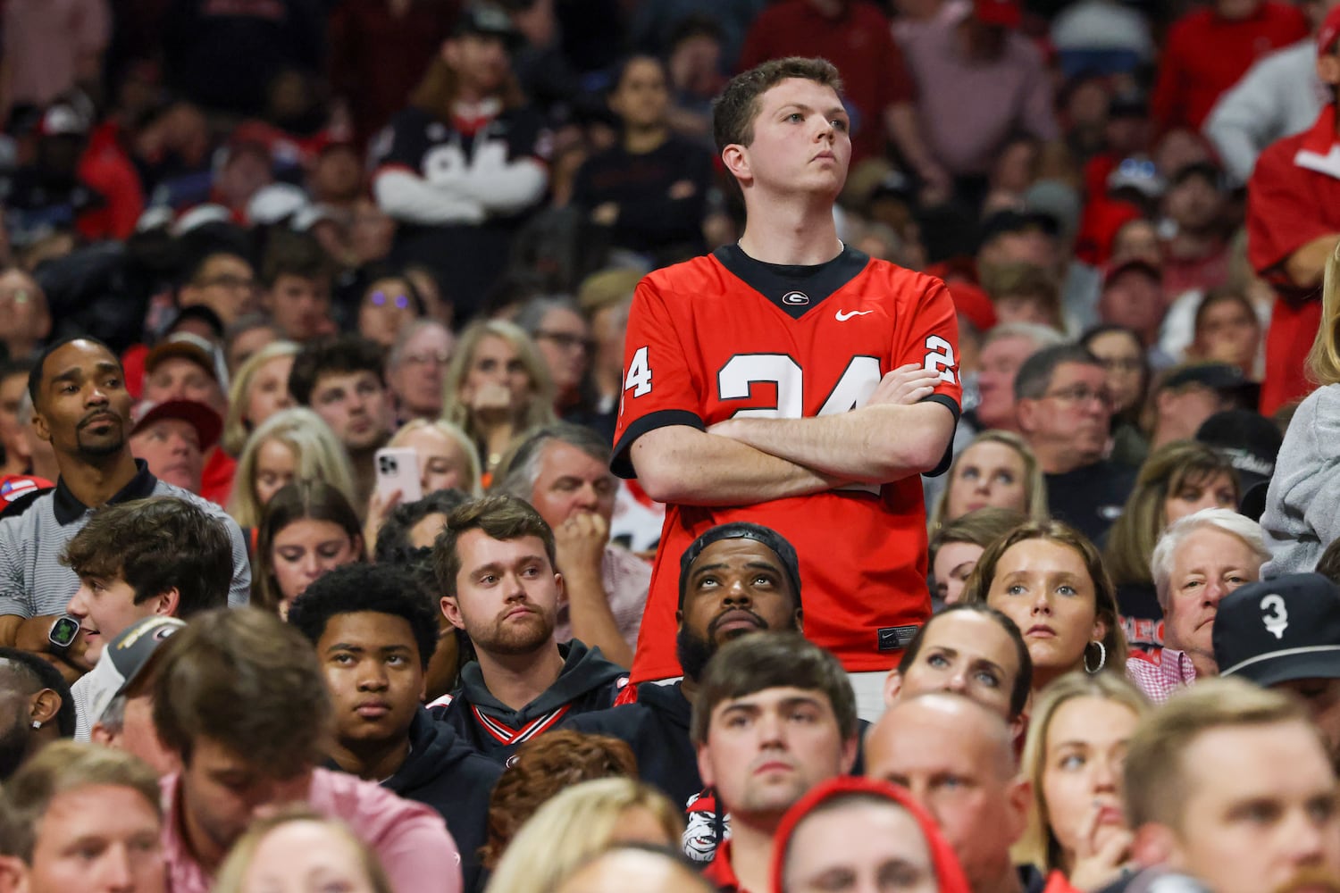 Georgia Bulldogs fans react in the final moments of the fourth quarter during the SEC Championship football game against the Alabama Crimson Tide at the Mercedes-Benz Stadium in Atlanta, on Saturday, December 2, 2023. Alabama defeated Georgia 27-24 to end the Bulldogs’ 29-game winning streak. (Jason Getz / Jason.Getz@ajc.com)