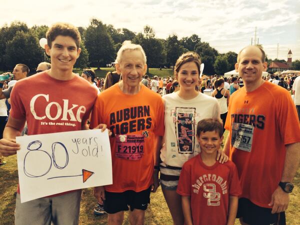 Jere Allen and proud family members after he ran the AJC Peachtree Road Race at age 80 in 2014.