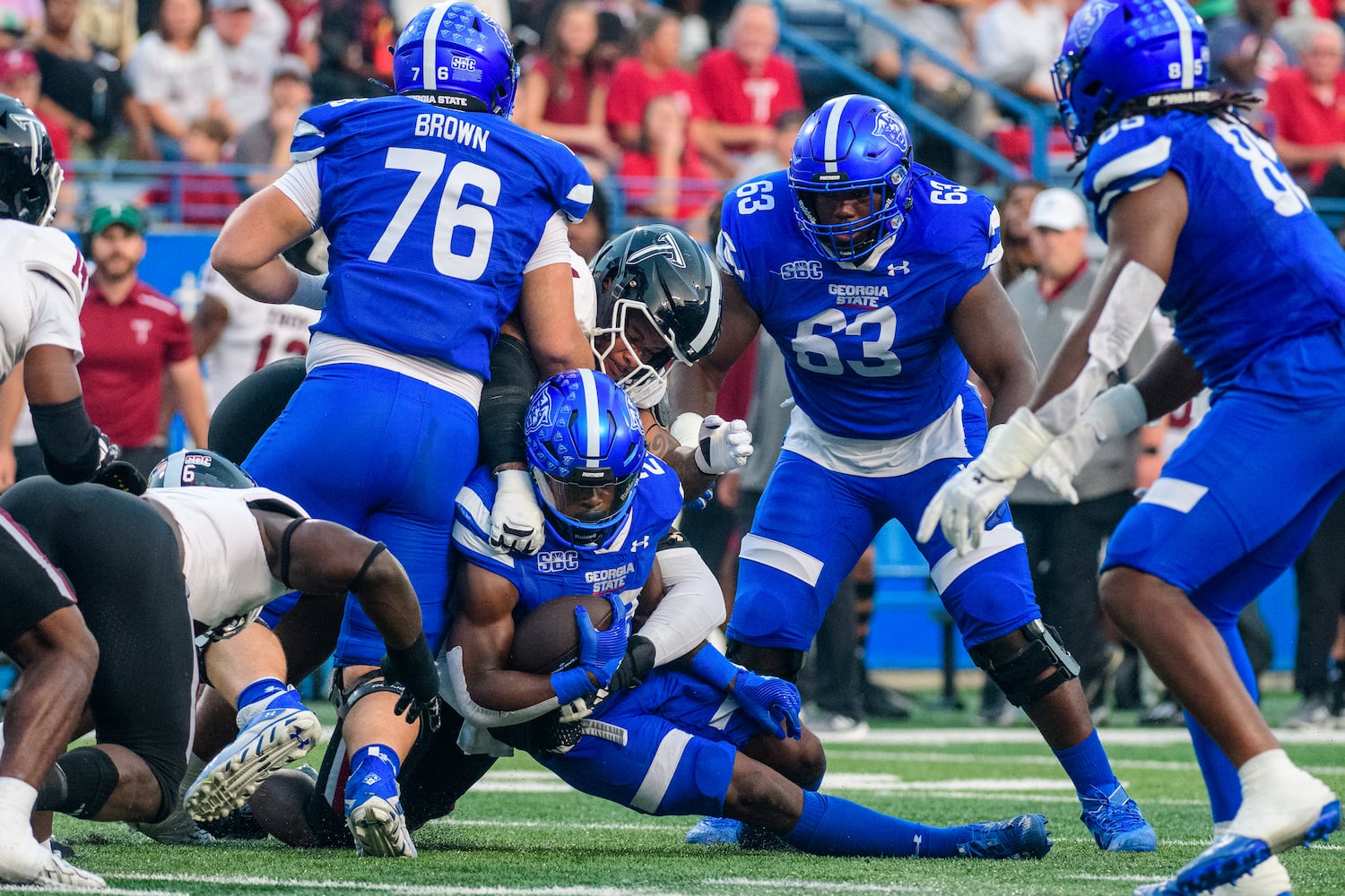 Georgia State running back Marcus Carroll is tackled against Troy Sept. 30, 2023 (Jamie Spaar for the Atlanta Journal Constitution)