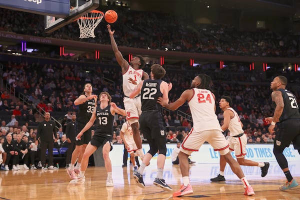 St. John's guard Kadary Richmond (1) shoots during the first half of an NCAA college basketball game against Butler in the quarterfinals of the Big East Conference tournament, Thursday, March 13, 2025, in New York. (AP Photo/Pamela Smith)