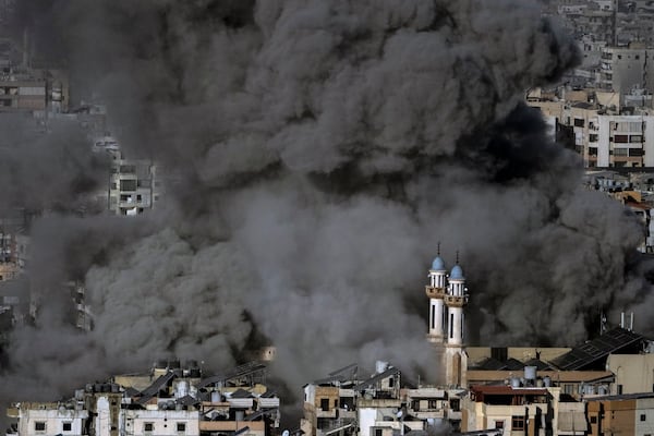 Smoke rises after an Israeli airstrike on Dahiyeh, in the southern suburb of Beirut, Lebanon, Friday, Nov. 22, 2024. (AP Photo/Bilal Hussein)