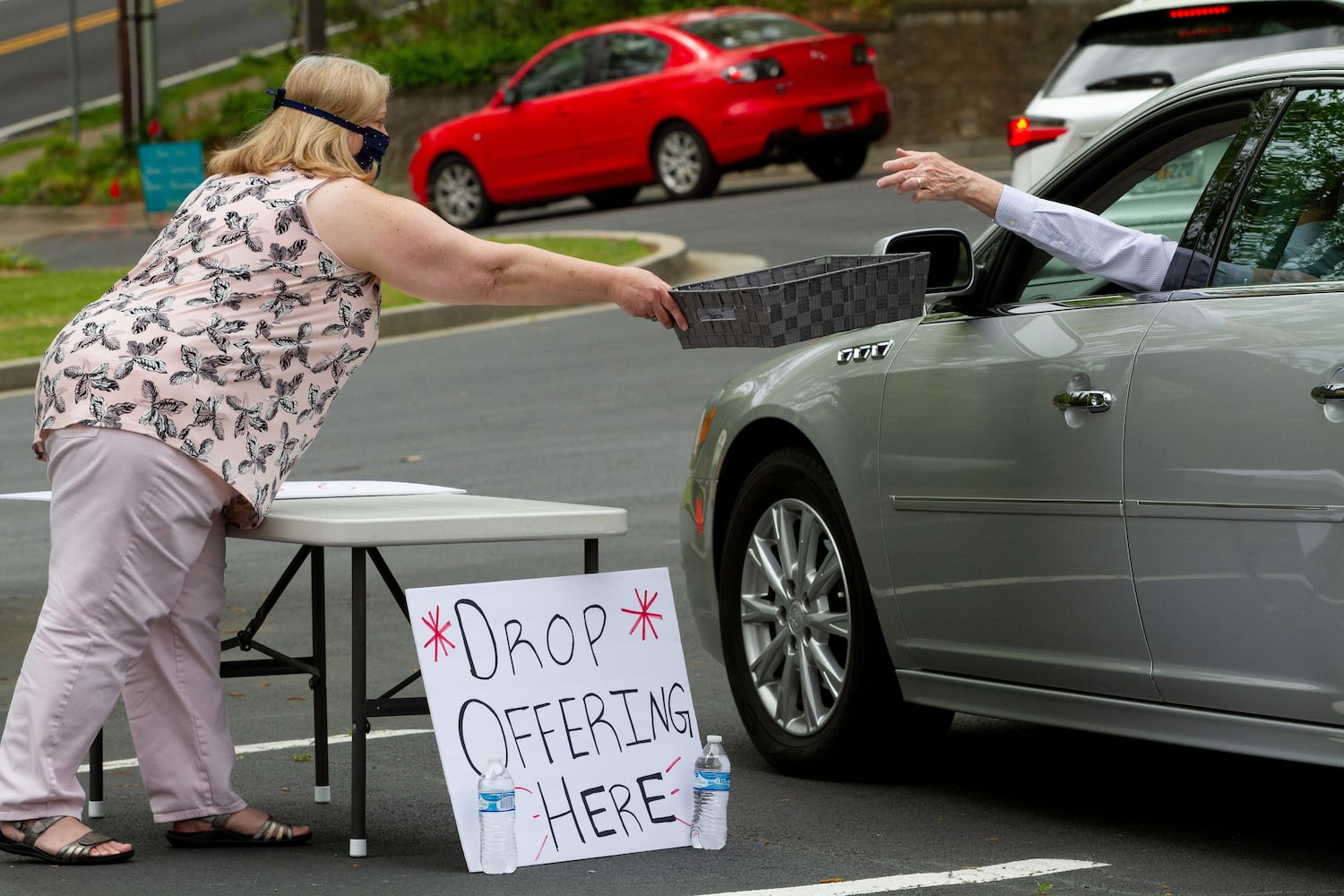 Churchgoers across metro Atlanta attend socially distant, drive-in services