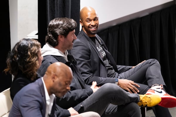 Donnie Beamer, right, head of Atlanta’s Office of Technology and Innovation, leads a “fireside chat” during a program to celebrate the one-year anniversary of the office on Tuesday, Jan. 9, 2024.   (Ben Gray / Ben@BenGray.com)