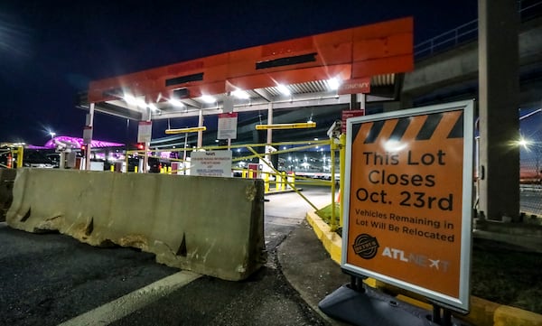 October 23, 2023 Hartsfield-Jackson International Airport: Hartsfield-Jackson International Airport has closed its popular South economy lot on Monday, Oct. 23, 2023 for a construction project, removing about 3,000 parking spaces from use next to the domestic terminal. The airport is advising travelers to use park-ride lots as an alternative, including the ATL West deck connected to the terminal via SkyTrain and the ATL Select lot. The airport has said it would add staff to “address public concerns” and signs to direct motorists. Other options for travelers include off-airport parking lots that offer shuttle service to the terminal, MARTA, taxis and rideshare services, including Uber and Lyft. Those planning to park at the airport for trips should consider making an advance parking reservation. The airport offers online reservations for its ATL West deck, ATL Select lot and international parking decks. Many off-airport lots also offer parking reservations. The North economy lot is still in use, but was already full by Monday morning when the South economy lot closed, according to the airport’s website, which lists parking lot status. Even before Monday’s closure of the South economy lot, airport parking decks and lots often reached capacity during busy periods, forcing motorists to drive around the airport searching for other lots and spaces while rushing to catch their flights. Hartsfield-Jackson is closing the South economy lot to build a new parking deck on the site. The new seven-level deck will have 6,700 parking spaces and updated technology including digital parking space availability indicators and ticketless entry and exit. It will take three years to build, and is part of a decade-long parking construction project that started last year. After the new parking deck is completed on the site of the South economy lot in late 2026, a phased construction project will begin to demolish and reconstruct the existing South and North decks next to the domestic terminal. Those aging decks were originally built in 1980. (John Spink / John.Spink@ajc.com) 


