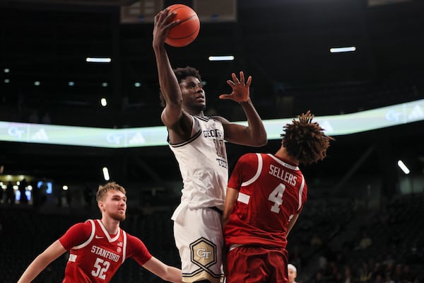 Georgia Tech forward Baye Ndongo (11) attempts a shot against Stanford guard Oziyah Sellers (4) during the first half at McCamish Pavilion, Wednesday, February, 12, 2024, in Atlanta. (Jason Getz / AJC)