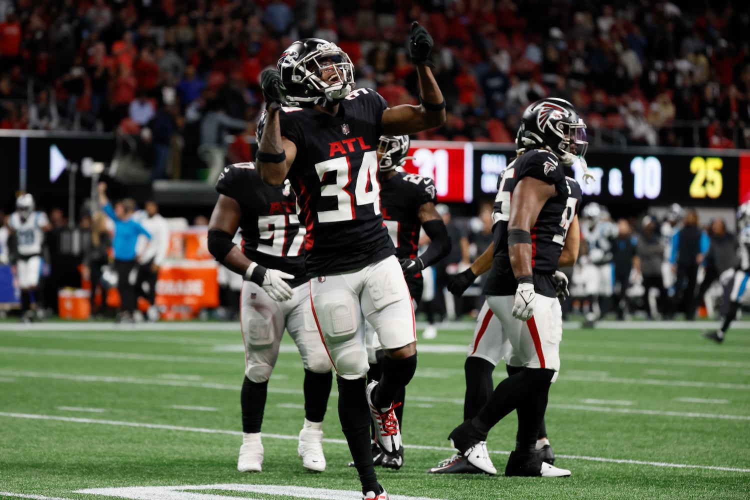 Falcons cornerback Darren Hall reacts at the end of regulation. The host Falcons defeated the Panthers 37-34 in overtime. (Miguel Martinez / miguel.martinezjimenez@ajc.com)