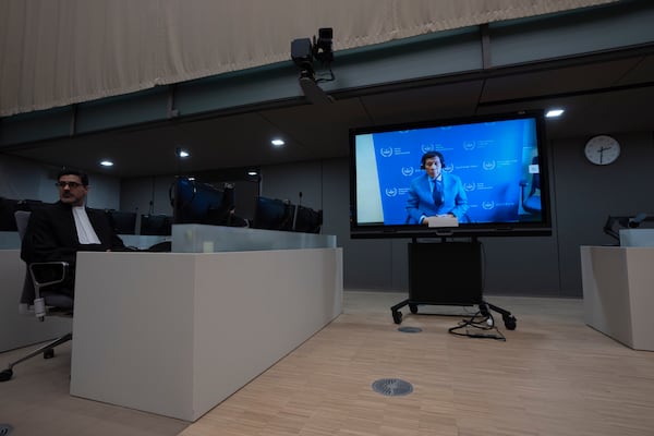 Former Philippine President Rodrigo Duterte is seen on a screen in the courtroom of the International Criminal Court (ICC) in The Hague, Netherlands, Friday, March 14, 2025. (AP Photo/Peter Dejong, Pool)