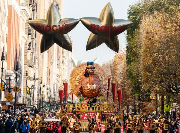 FILE - The Tom Turkey float leads the way down Central Park West during the Macy's Thanksgiving Day Parade on Nov. 24, 2022, in New York. (AP Photo/Jeenah Moon, File)