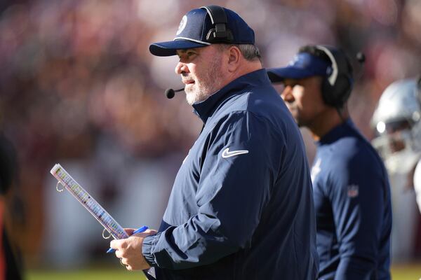 Dallas Cowboys head coach Mike McCarthy looks on during the first half of an NFL football game against the Washington Commanders, Sunday, Nov. 24, 2024, in Landover, Md. (AP Photo/Stephanie Scarbrough)