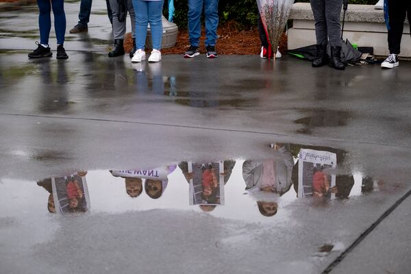 Protesters gathered outside the Gwinnett Justice and Administration building in Lawrenceville on Tuesday.