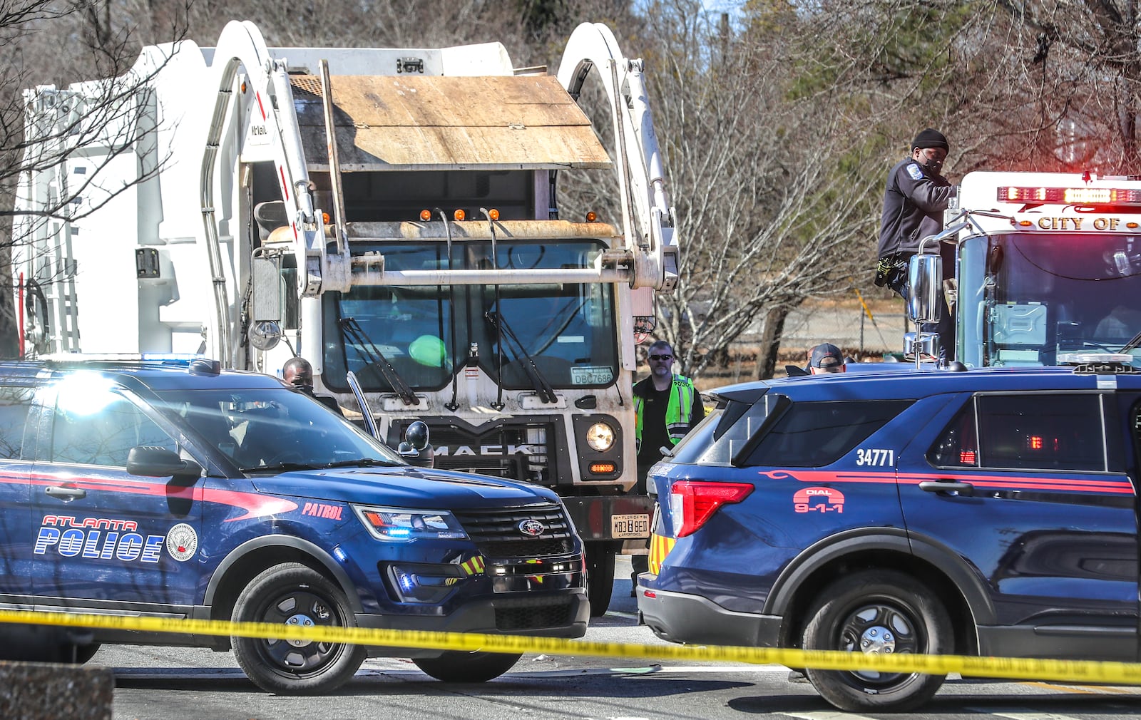 A pedestrian was killed Feb. 14, 2022, on a busy road in southwest Atlanta. The body was removed from the scene along Campbellton Road near Adams Park and the Andrew & Walter Young Family YMCA. John Spink/John.Spink@ajc.com

