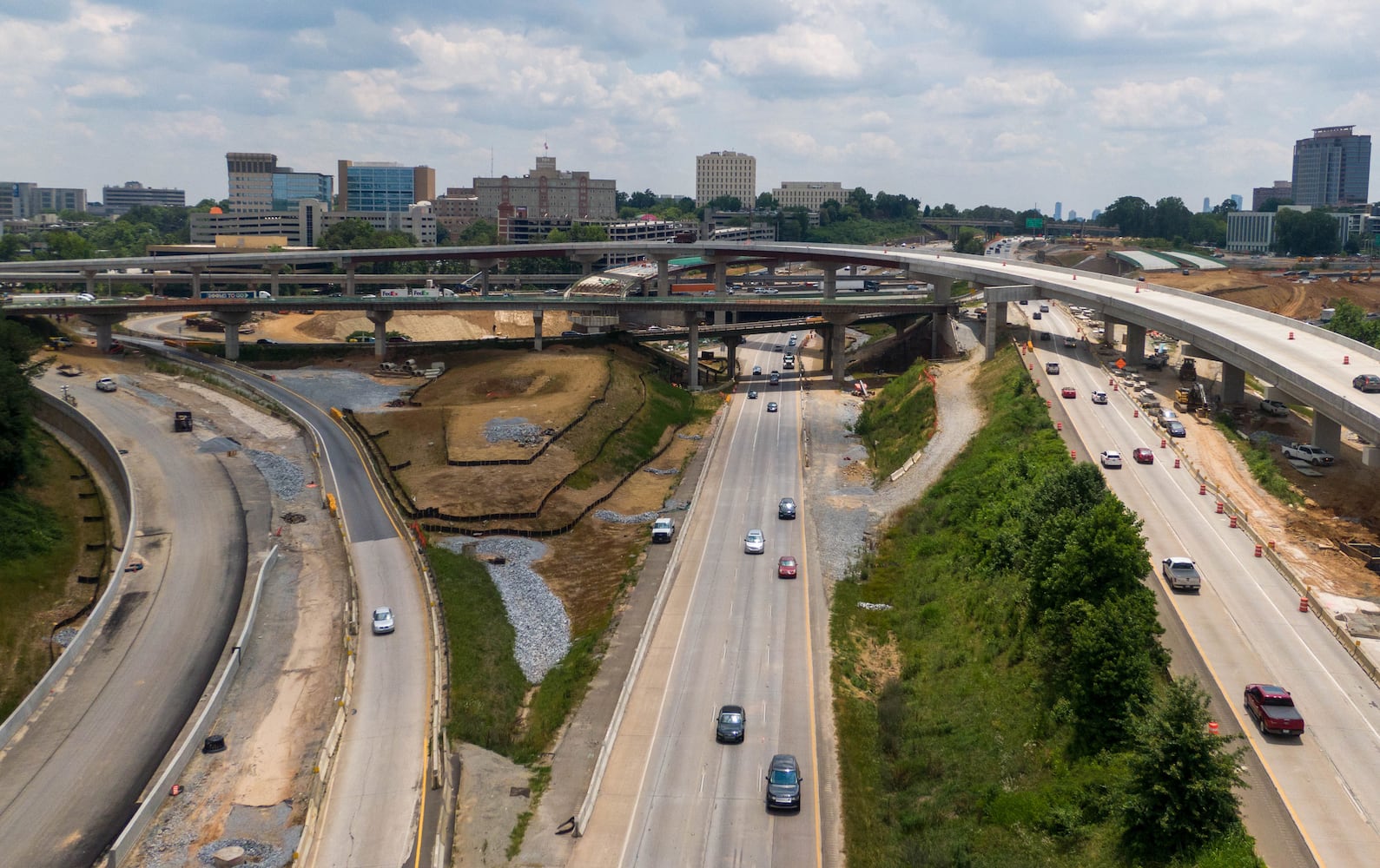 May 27, 2021 Sandy Springs - Aerial photo shows construction site of I-285 interchange at Ga. 400 in Sandy Springs on Tuesday, May 27, 2021. (Hyosub Shin / Hyosub.Shin@ajc.com)