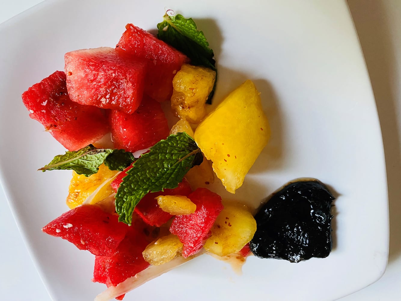 Watermelon salad with local watermelon, charred fennel jam, cow’s cheese, balsamic vinegar and herbs from Restaurant Holmes.