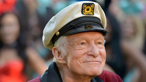 Hugh Hefner poses at Playboy's 60th Anniversary special event on January 16, 2014 in Los Angeles, California. Hefner died at age 91 in 2017.