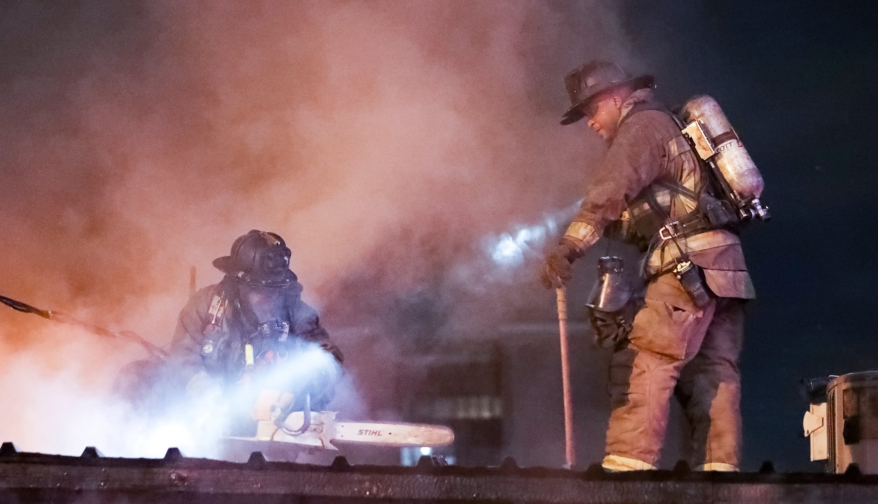 Fire broke out at the Buckhead Tin Lizzy’s Cantina on Tuesday morning, Sept. 20, 2022 sending huge flames shooting high above the roofline. Firefighters were called to the Piedmont Road restaurant shortly before 6 a.m. and were able to extinguish the bulk of the flames in the first five minutes, according to Atlanta fire Battalion Chief Quincey Watts. It took hours more to punch holes in the roof once fire spread into the ceiling, he said. (John Spink / John.Spink@ajc.com)

