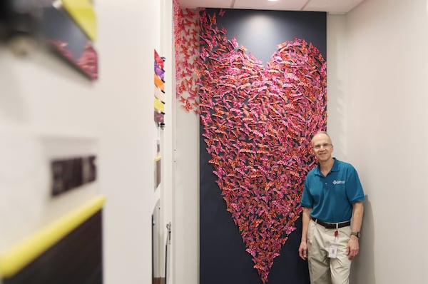 Butterflies in the shape of a heart take flight in a corner of the Midtown offices of Laureate Medical Group, where Dr. Scott Shulman has created 14 works of art that are on display. Shulman began installing some of his artwork in the offices almost five years ago. He now has 38 pieces in four of the eight Laureate locations. EMILY HANEY / EMILY.HANEY@AJC.COM