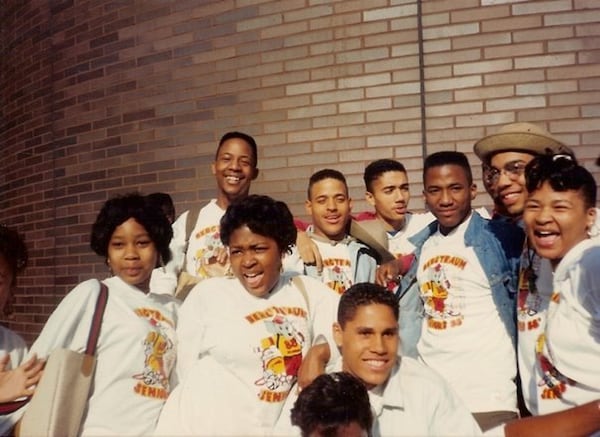 Joel Alvarado, (kneeling) graduated from Murry Bergtraum High School in lower Manhattan in 1988. Among his classmates were Jonathan William Davis (above his left shoulder), who would go on to fame as rapper Q-Tip of A Tribe Called Quest, and Nathaniel Hall (in hat), who would become Afrika Baby Bam when he formed the legendary rap collective The Jungle Brothers. COURTESY JOEL ALVARADO