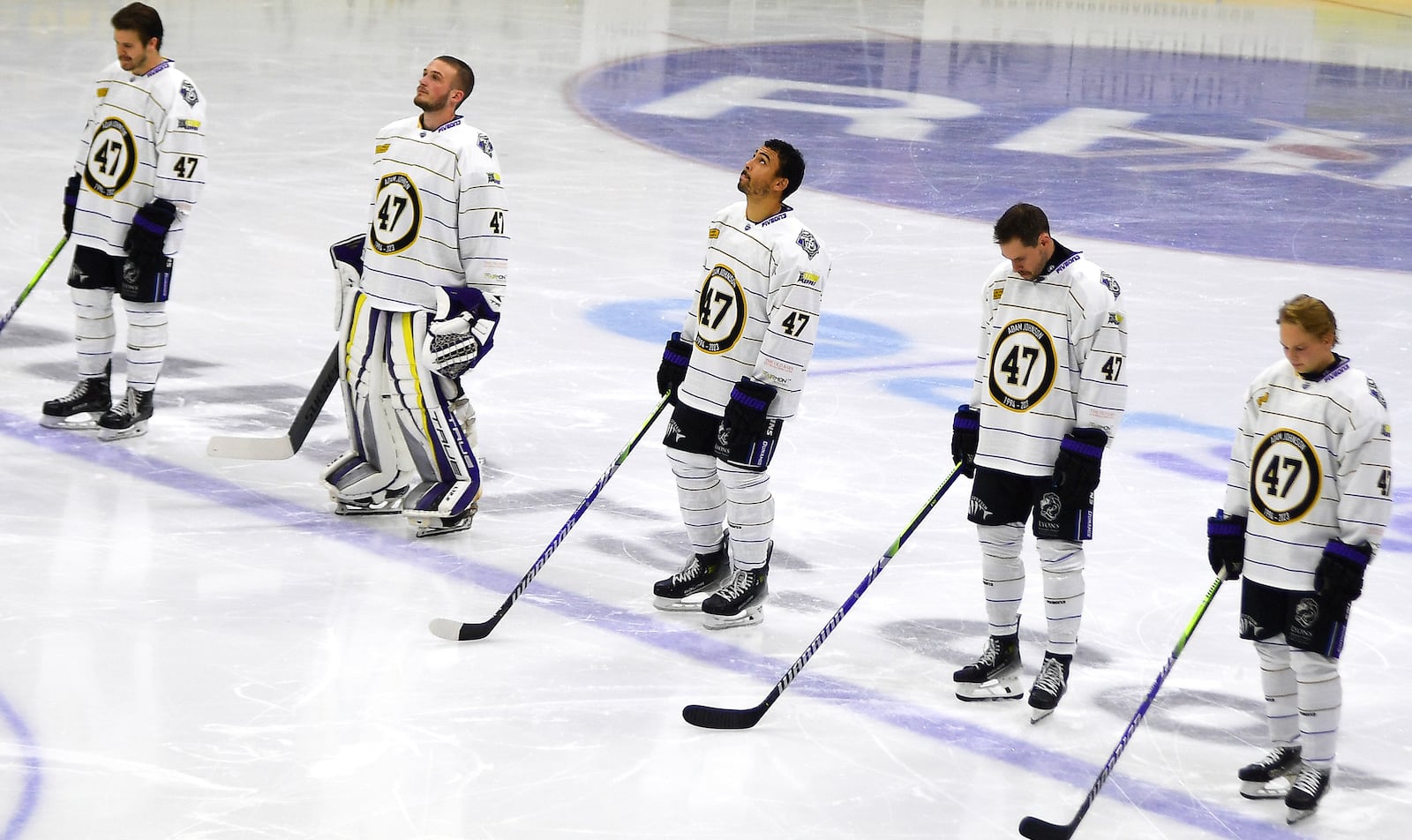 FILE - Manchester Storm players wearing number 47, Adam Johnson's number, pay tribute before the Ice Hockey Adam Johnson memorial game between Nottingham Panthers and Manchester Storm at the Motorpoint Arena, Nottingham, England, Nov. 18, 2023. (AP Photo/Rui Vieira, File)