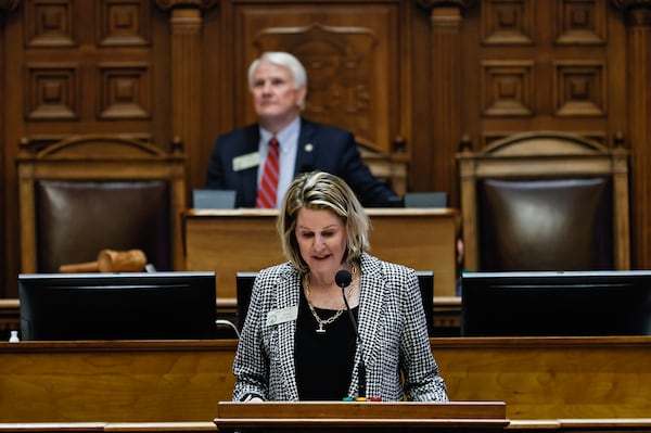 Rep. Jan Jones speaks as Speaker Jon Burns looks on the first day of the Georgia legislative session the Georgia State Capitol on Monday, January 9, 2023.  (Natrice Miller/The Atlanta Journal-Constitution)