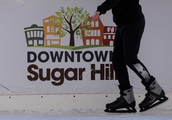 Skaters take to the ice at the Have an Ice Day rink in downtown Sugar Hill on Saturday afternoon, December 26, 2020. (Photo: Ben Gray for The Atlanta Journal-Constitution)