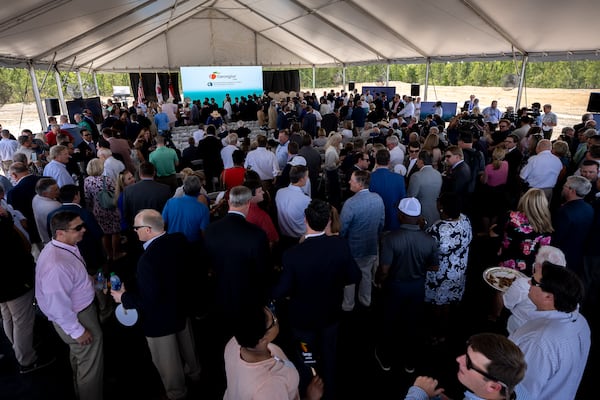 ELLABELL, GEORGIA - MAY 20, 2022:  People gather under a tent for an announcement event at the site where South Korean automotive giant Hyundai Motor Group will build an electric vehicle plant in Ellabell, Ga. It is the second major electric vehicle factory announcement in Georgia since December as state economic development officials try to turn the Peach State into an important manufacturing hub for battery-powered automobiles. (AJC Photo/Stephen B. Morton)