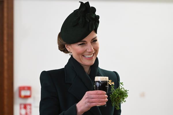 Britain's Kate, the Princess of Wales, gestures during a reception with the Irish Guards, at a special St Patrick's Day parade and celebration at Wellington Barracks in London, Monday, March 17, 2025. (Eddie Mulholland/Pool photo via AP)