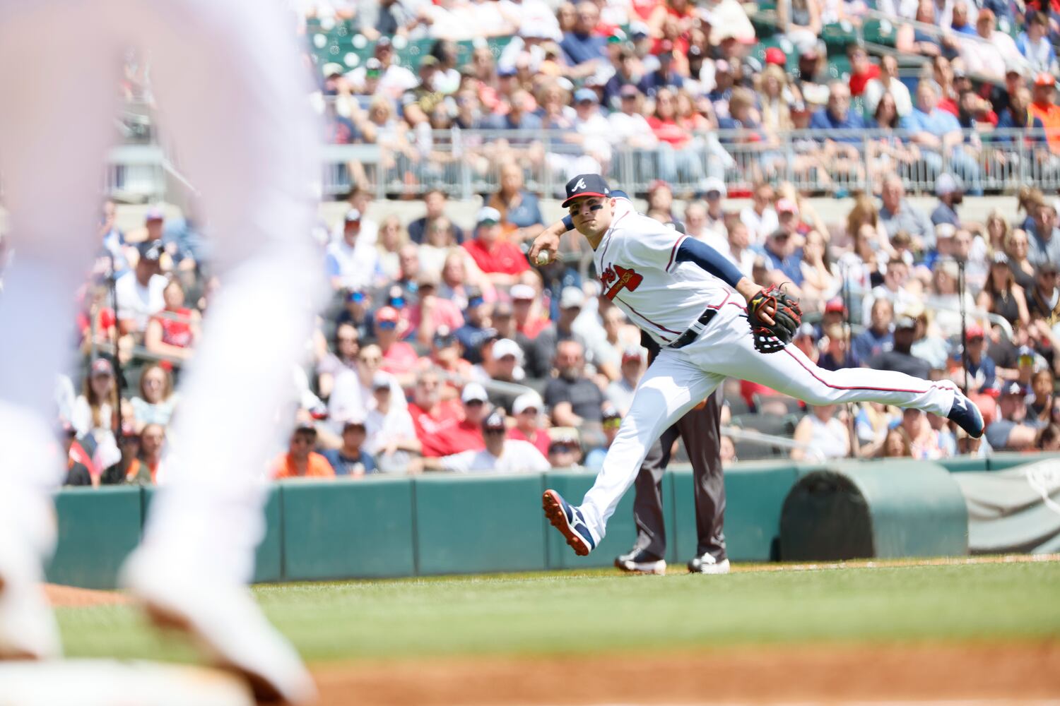 Braves third baseman Austin Riley is unable to make a play after catching a ground ball during the first inning gainst the Astros at Truist Park on Sunday, April 23, 2023, in Atlanta. 
Miguel Martinez / miguel.martinezjimenez@ajc.com 