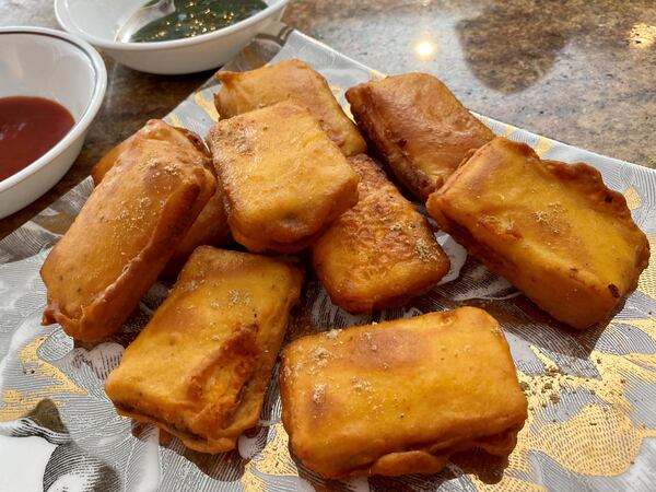 The Malhotra family’s paneer pakoras are a favorite appetizer. (Wendell Brock for The Atlanta Journal-Constitution)